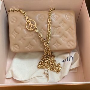Louis Vuitton POCHETTE COUSSIN Camel